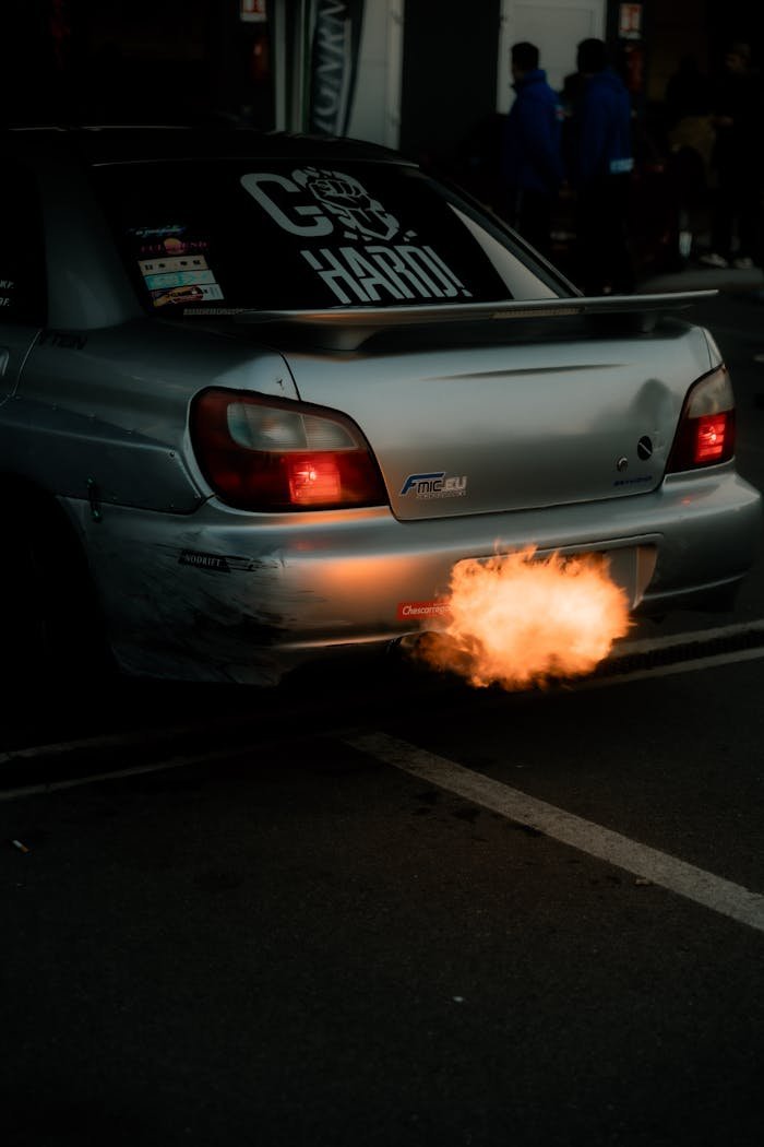 portfolio-06 Car backfire with flames at a motorsport event in Cremona, Italy. High-energy vehicle moment.